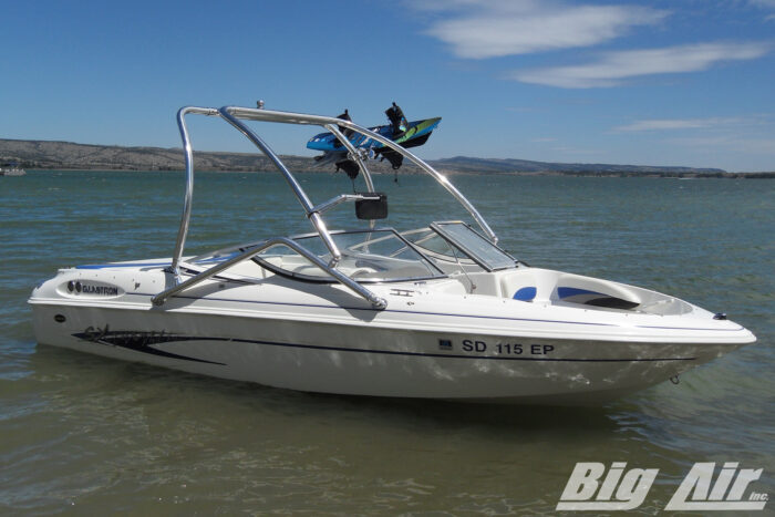 2003 Glastron sx195 boat with Big Air Vapor tower in polished finish. Equipped with a Big Air Articulating mirror and rack