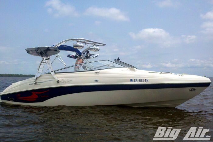 Rinker Captiva 232 boat with a Big Air Wave tower in polished finish. Equipped with Dual Bullet Speakers
