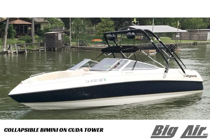 A Big Air Collapsible Bimini attached to a Big Air Cuda wakeboard tower mounted onto a 1998 Bryant 230 boat