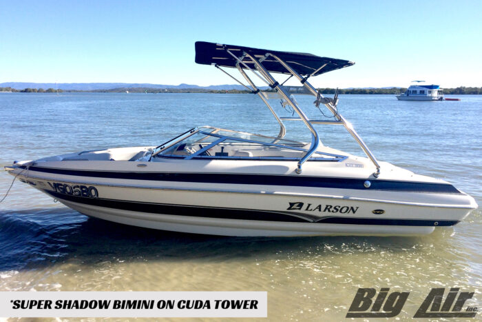 Larson boat showcasing a Big Air Cuda Tower and Super Shadow Bimini