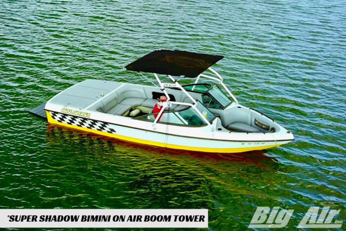 Calabria boat with an Air Boom tower showcasing a Big Air Super Shadow Bimini top mounted to it