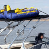 Four Winns boat with a Big Air Cuda tower and Tube Top bimini mounted on it