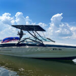 boat on the water showing the Big Air Twister Tower and Big Air Super Shadow Bimini