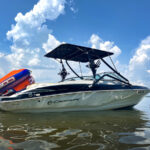 boat on the water showing the Big Air Twister Tower and Big Air Super Shadow Bimini