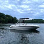 customer testimonial image of a 1999 Bryant 196 Limited boat with a Big Air Cuda tower and Tube Top bimini