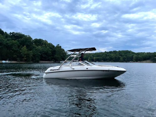 customer testimonial image of a 1999 Bryant 196 Limited boat with a Big Air Cuda tower and Tube Top bimini