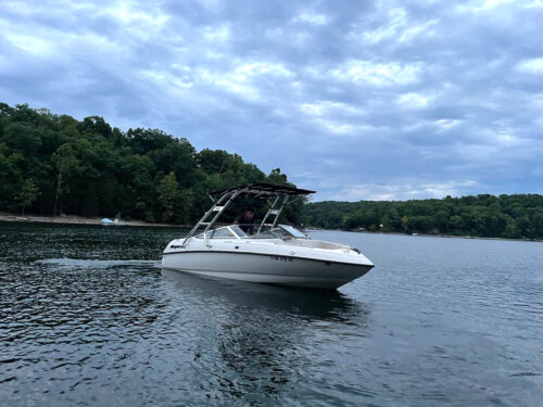 customer testimonial image of a 1999 Bryant 196 Limited boat with a Big Air Cuda tower and Tube Top bimini