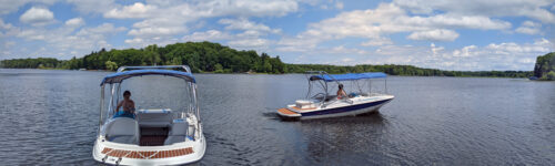 dual image of a bayliner boat on the water with a big air haus tower mounted to clear the bimini top