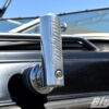 big air hull mounted flag holder mounted on the side of the hull of a black boat